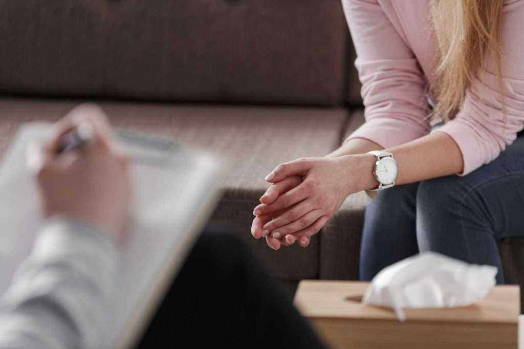 Two people talking during a bereavement counselling session