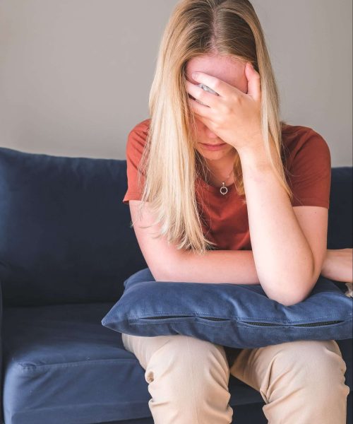Person not feeling well with their face resting in their hand. ketamine, Ketamine Addiction, Is ketamine addictive, What is ketamine, Effects of ketamine, Ketamine effects, Overdose of ketamine, Withdrawal from ketamine, Ketamine detox, Ketamine Addiction Treatment